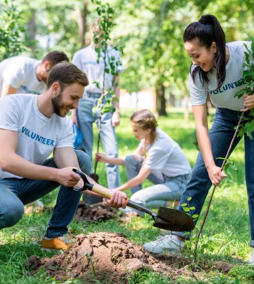 young-volunteers-planting-trees-in-green-park-together.jpg young-volunteers-planting-trees-in-green-park-together.jpg